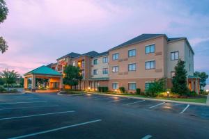 a rendering of a hotel with a parking lot at Courtyard by Marriott Montgomery Prattville in Prattville