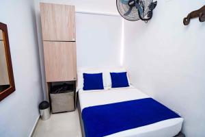 Postel nebo postele na pokoji v ubytování Hotel Casa 10