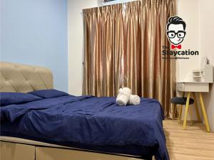Postel nebo postele na pokoji v ubytování Staycation Homestay 26 P Residence near bt kawa + 21 fotografií