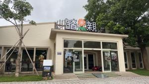 a store with a sign on the top of it at Touching Camping in Hou-lung-tzu