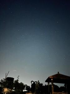 a starry night with the sky in the background at Touching Camping in Hou-lung-tzu