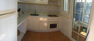 Kuchyň nebo kuchyňský kout v ubytování Apartamentos San Bruno Canela