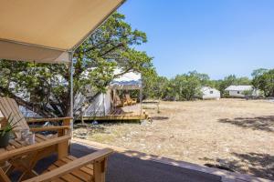 a view from the porch of a yurt at Twin Falls Adventure Tent in Boerne