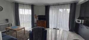 TV a/nebo společenská místnost v ubytování Apartament Blue Sky