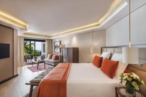 Postel nebo postele na pokoji v ubytování Royal Palm Beachcomber Luxury + 37 fotografií