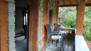 Posezení v ubytování Pondok Wisata Grya Sari