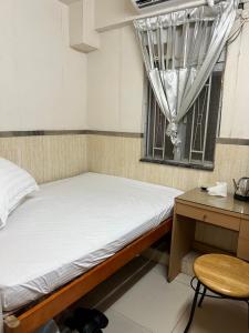 Letto o letti in una camera di 泰豪賓館