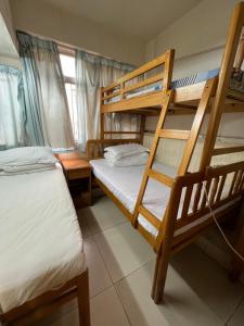 Letto o letti in una camera di 泰豪賓館