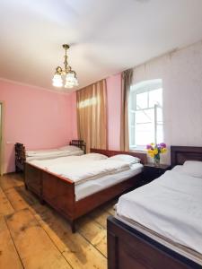 Een bed of bedden in een kamer bij Guest House LALI