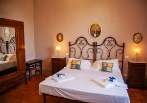 Posteľ alebo postele v izbe v ubytovaní Agriturismo Villa Ulivello in Chianti