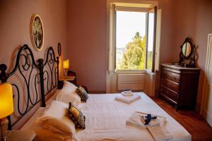 Posteľ alebo postele v izbe v ubytovaní Agriturismo Villa Ulivello in Chianti