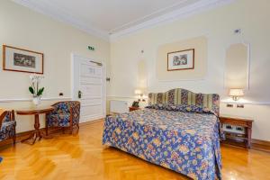Voodi või voodid majutusasutuse Hotel Cellini toas