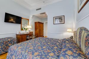 Voodi või voodid majutusasutuse Hotel Cellini toas
