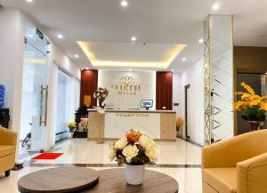 Posezení v ubytování Luxtel Hotel Ngoại Giao Đoàn