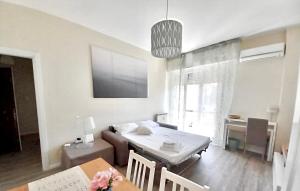 Krevet ili kreveti u jedinici u okviru objekta Lovely suite with private parking in Como