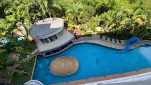 an aerial view of a swimming pool in a resort at Laguna Beach Resort 1 by BPS in Jomtien Beach