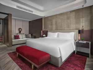 Voodi või voodid majutusasutuse InterContinental Hotels Shenzhen WECC by IHG toas