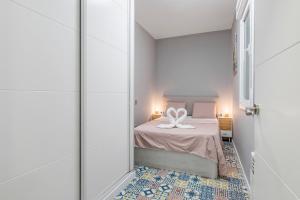 Postel nebo postele na pokoji v ubytování Cerca Santiago Bernabéu - Apartamento TORRE PICASSO