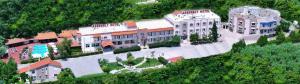 an aerial view of a building on a hill at Assembly Hotel in Anchialos