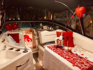 a boat with a table in the back of it at Loveboat in Thonon-les-Bains