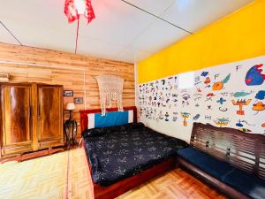 Giường trong phòng chung tại Saigonese Trekking House