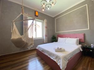 Postel nebo postele na pokoji v ubytování Dylan Hotel