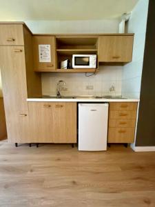 Kuchyň nebo kuchyňský kout v ubytování Apartamentos Turisticos Poblado