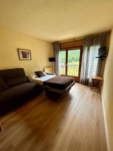 TV a/nebo společenská místnost v ubytování Apartamentos Turisticos Poblado
