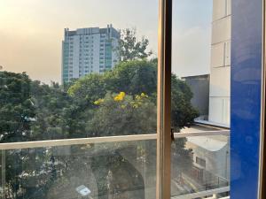 Uma varanda ou terraço em CVS The Hotel