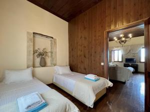 Ένα ή περισσότερα κρεβάτια σε δωμάτιο στο Villa Faye +25 φωτογραφίες