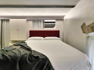 En eller flere senge i et værelse på La mia limonaia sui colli, garden, parking, fit for bike !