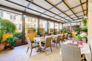 Restoran või mõni muu söögikoht majutusasutuses Hotel Cellini