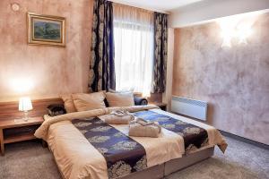 Postel nebo postele na pokoji v ubytování Platinum Image Hotel + 20 fotografií