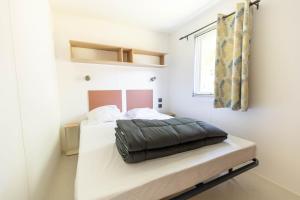 Postel nebo postele na pokoji v ubytování Camping Royal Ocean