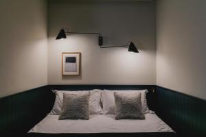 Voodi või voodid majutusasutuse Albergo Miramonti toas
