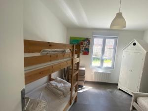 Postel nebo postele na pokoji v ubytování La perroche