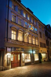 a large building with a clock on the front of it at Sorell Hotel Krone in Winterthur