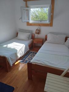 Postel nebo postele na pokoji v ubytování Apartment Ma're