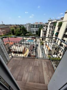 a balcony with a view of a city at GioiaHomes in Milan