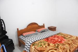 Postel nebo postele na pokoji v ubytování Pedro Resort & Bungalow Nuwara Eliya