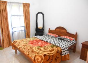 Postel nebo postele na pokoji v ubytování Pedro Resort & Bungalow Nuwara Eliya