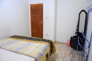 Postel nebo postele na pokoji v ubytování Pedro Resort & Bungalow Nuwara Eliya