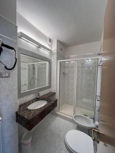 Koupelna v ubytování Hotel Alinari
