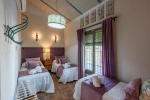 Ένα ή περισσότερα κρεβάτια σε δωμάτιο στο Villa Colona +72 φωτογραφίες