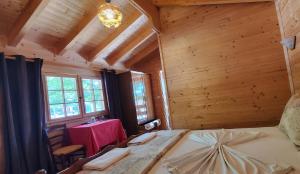 Postel nebo postele na pokoji v ubytování Hotel Panorama Dajt