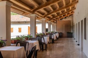 Restaurant o un lloc per menjar a Agriturismo Il Bosco Camere