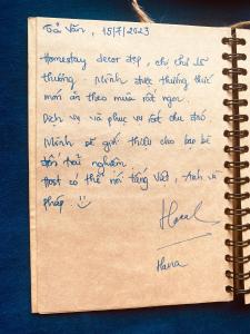 a handwritten letter on top of a notebook at maison Rose & Jardinier eco homestay in Sa Pả