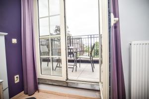 Balkoni atau teres di B&B Fruithof Tack