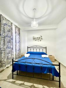 Postel nebo postele na pokoji v ubytování B&B Cala Del Borgo