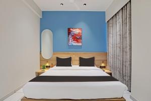 Postel nebo postele na pokoji v ubytování HOTEL LEE PLATINUM